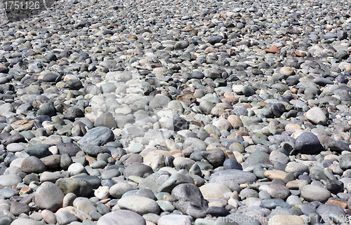 Image of The mound of stones on the bottom of dried-up river