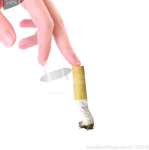 Image of Cigarette in a hand on the white