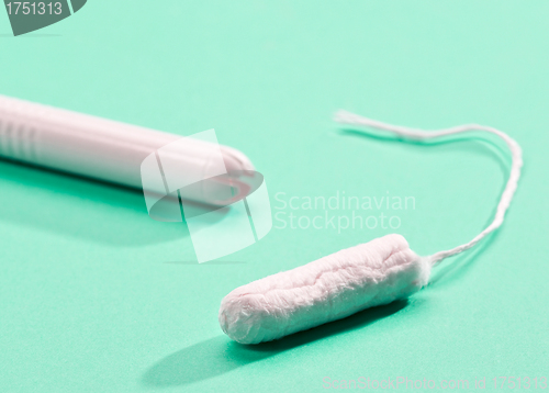 Image of cardboard applicator tampon on white background