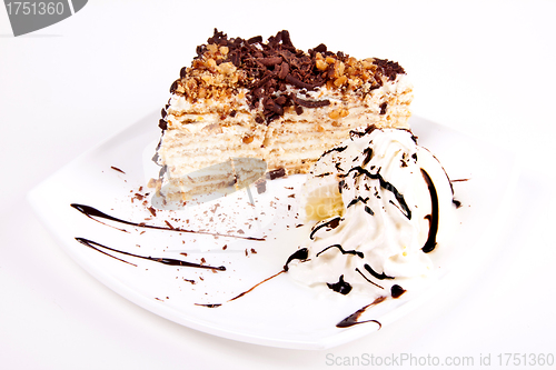 Image of Chocolate brownie with vanilla ice-cream and chocolate sauce
