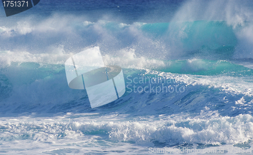 Image of Blue sea with waves and sky with clouds