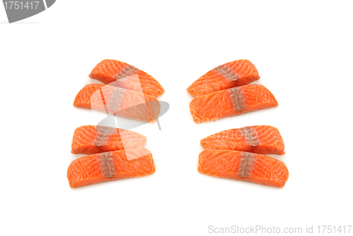 Image of fresh uncooked red fishes fillet over white