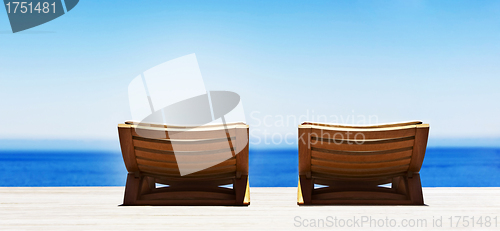 Image of Beach chairs on perfect tropical sand beach