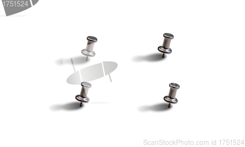 Image of grey metal pushpin set isolated