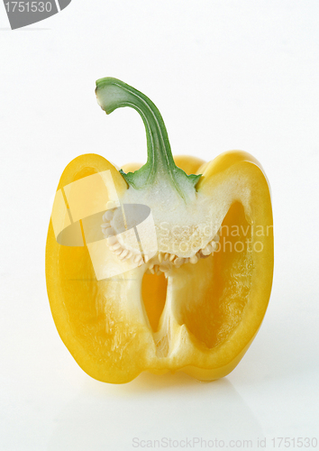 Image of fresh yellow paprika half isolated on white
