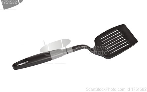 Image of Black plastic kitchen spatula isolated on white