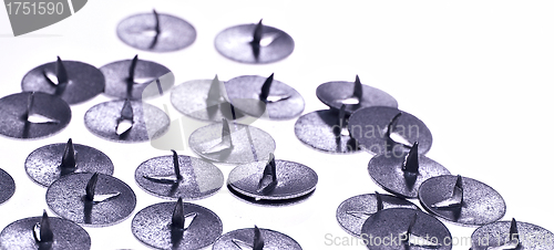 Image of push pins on white background