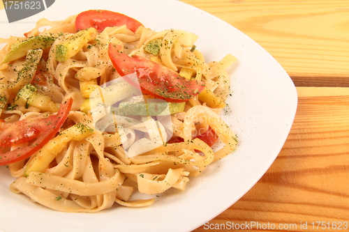 Image of Pasta with tomatoes and pancetta