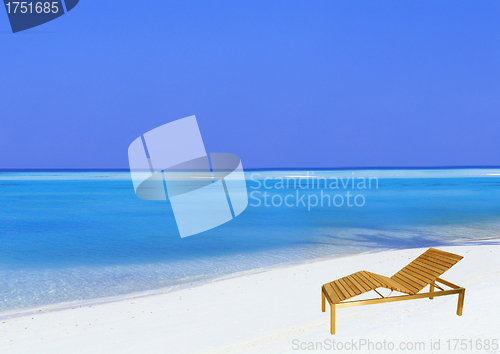 Image of beach chair on white sandy tropical beach