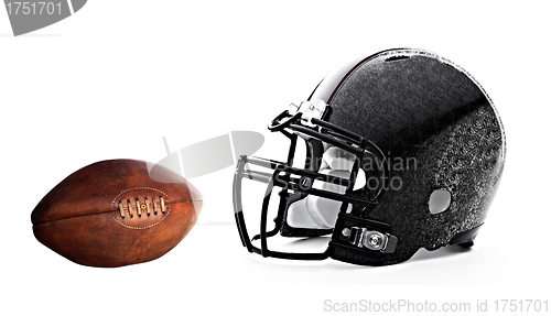 Image of football helmet and leather football