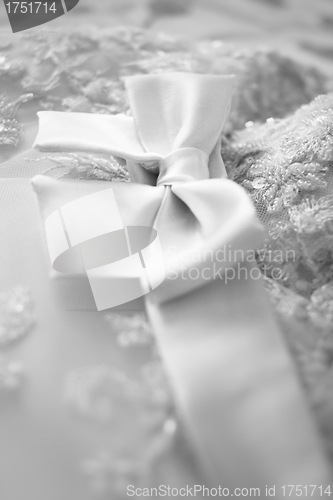 Image of bridesmaid dress with a large silk bow