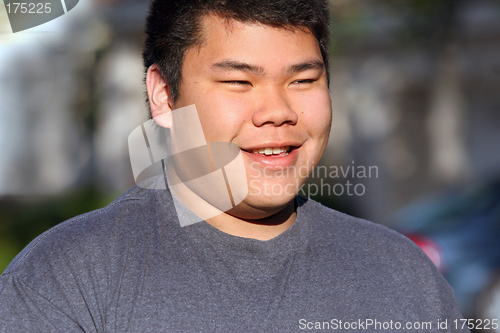 Image of Asian teenager outdoors