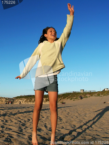 Image of Happy girl on the beach