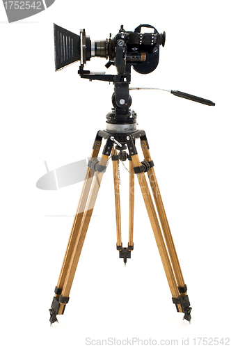 Image of The movie camera and tripod.