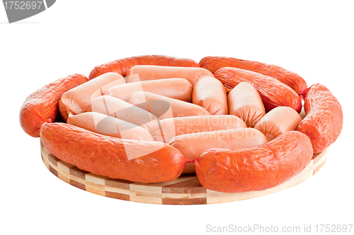 Image of delicious sausages on board