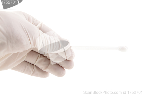 Image of Medical hand holding glass stick