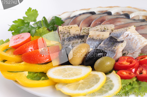 Image of fish with vegetables,anion red pepper