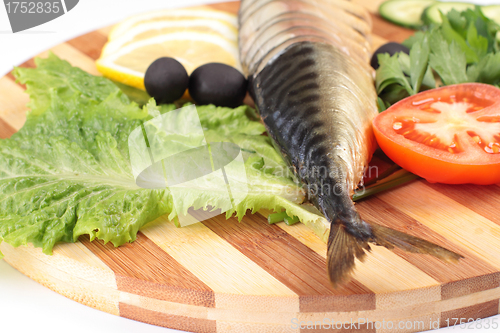 Image of sliced herring with vegetables