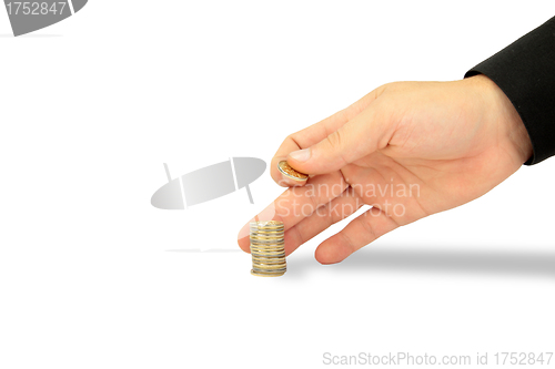 Image of hand with coins