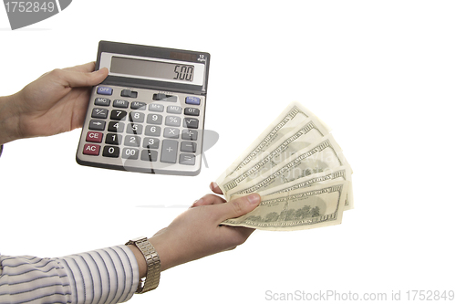 Image of calculator and 500 dollars in hands