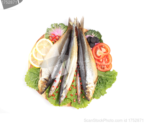 Image of pickled herring with tomato rings