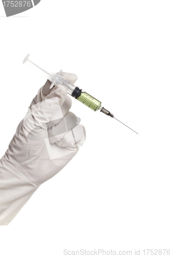 Image of Hand holding syringe isolated on white