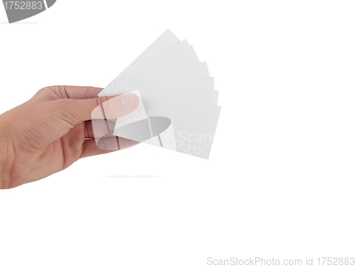Image of Hand holding many business cards