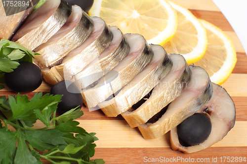 Image of herring fillets with herbs