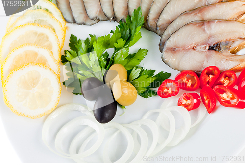 Image of sliced fish with vegetables