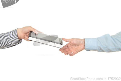 Image of Hand holding a book