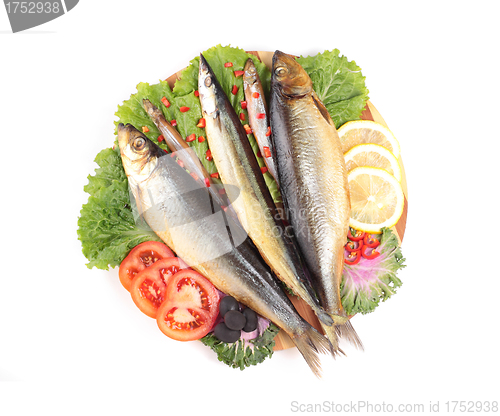 Image of fish with lemon on plate