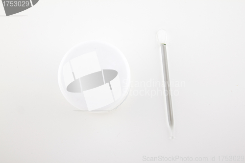 Image of Cream container with glass stick