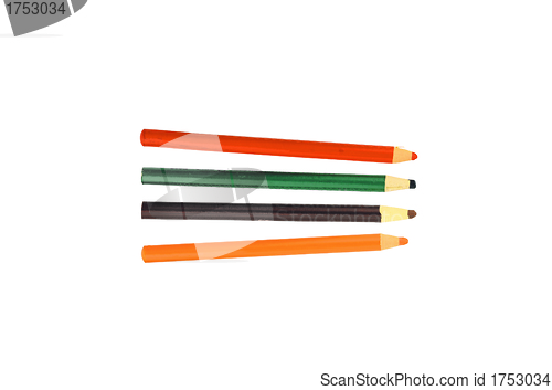 Image of four colored pencils across white