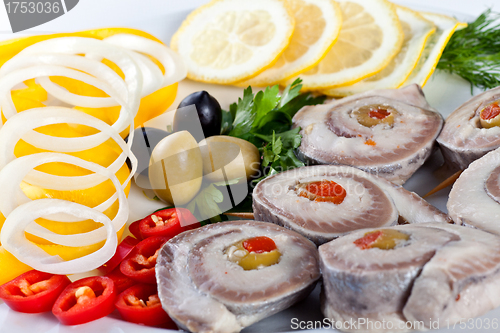 Image of sliced fish with vegetables