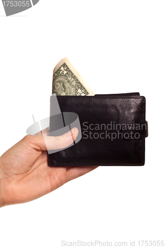 Image of hand holding purse with dollar