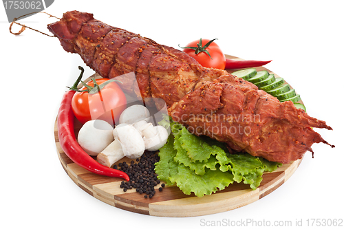 Image of sausage on plate with vegetables