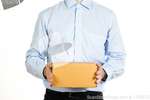 Image of Businessman holding a paper box isolated