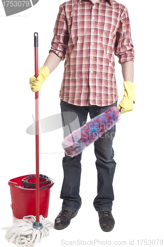 Image of Young sweeping man workwear. Isolated