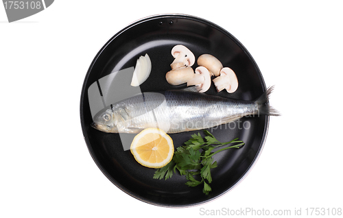 Image of fish in pan with vegetables