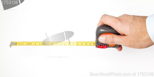 Image of Hand holding a measuring roulette