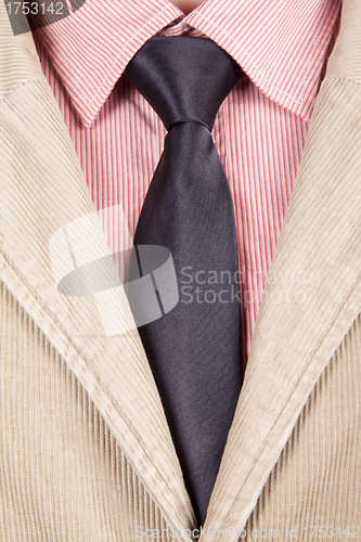 Image of Close-up of red striped shirt with black tie