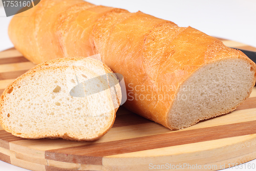 Image of sliced fresh bread on board
