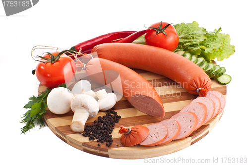 Image of sliced sausage with vegetables