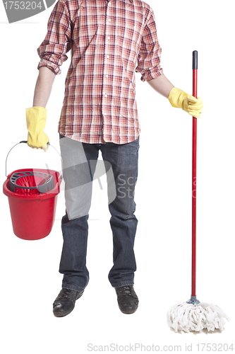 Image of Young sweeping man workwear. Isolated