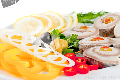 Image of fish with vegetables and olives