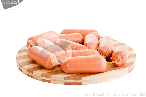 Image of delicious sausages on board