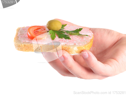 Image of man holding delicious toast