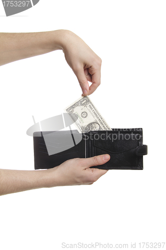 Image of hand-pulling the dollar from purse isolaetd