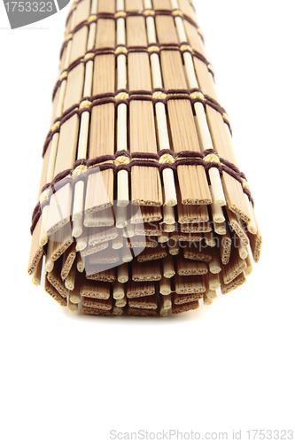 Image of folded bedding wooden tea isolated