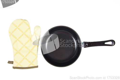 Image of Kitchen glove with pan on a white